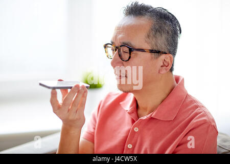 man using voice command recorder on smartphone Stock Photo