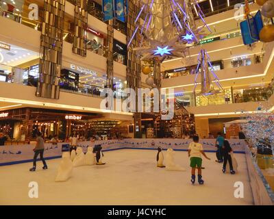 Ice skating at the new renovated Saigon Centre at Le Loi Street in District 1 in Ho Chi Minh City - christmas decoration and shopping | usage worldwide Stock Photo