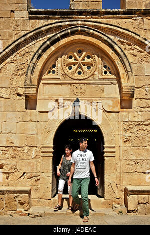 VIsitors in the medieval (Venetian) monastery of Ayia Napa, at Ayia Napa town, district of Ammochostos (Famagusta), Cyprus. Stock Photo