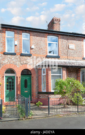 typical working class red brick terraced house in manchester uk originally built 1908 Stock Photo