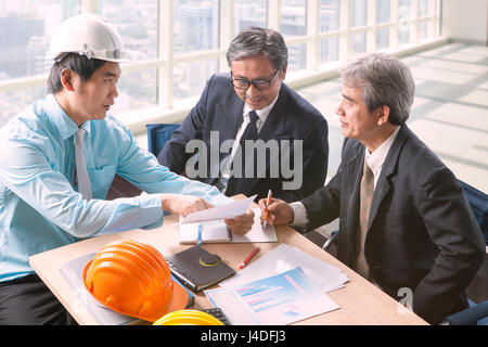 engineering man and senior architecture team project meeting in working office Stock Photo