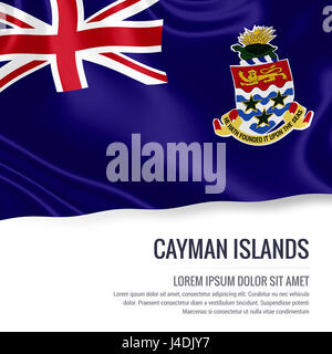 Silky flag of Cayman Islands waving on an isolated white background with the white text area for your advert message. 3D rendering. Stock Photo