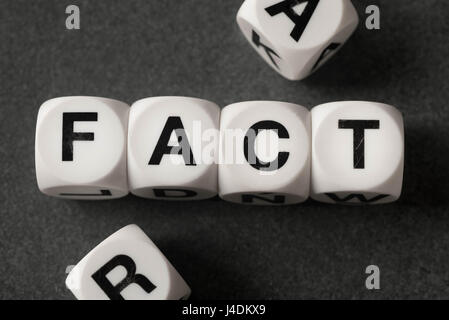 word fact on white toy cubes Stock Photo