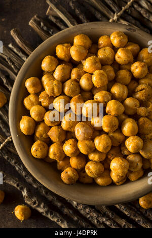 Homemade Spicy Salted Baked Chickpeas in a Bowl Stock Photo
