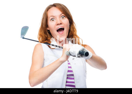 Shocked golfer looking behind the trajectory of a ball flying in front of a white background Stock Photo