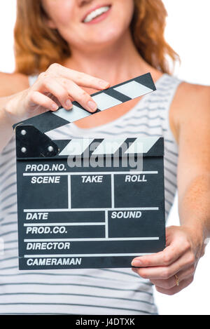 movie clapper in female hands in focus close-up Stock Photo