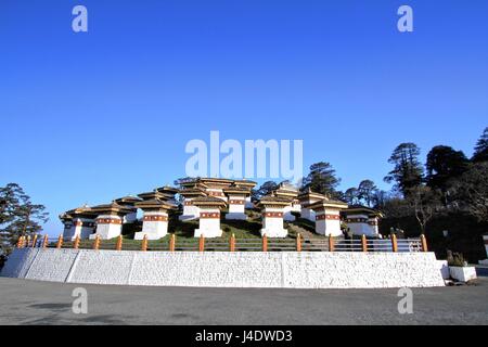 The 108 chortens (stupas) is the memorial in honour of the Bhutanese soldiers at  Dochula Pass on the road from Thimphu to Punaka, Bhutan Stock Photo