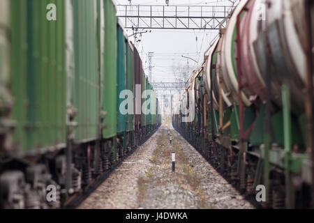 Freight trains on railway station (selective focus used) Stock Photo