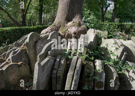 Hardy Tree in churchyard of St Pancras Old Church, London; monument created from tombstones disturbed during the construction of St Pancras Station Stock Photo