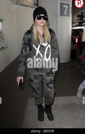 Los Angeles, California, USA. 11th May, 2017. Khloe Kardashian seen walking at LAX wearing XO camouflage outfit on May 11, 2017 in Los Angeles, California on May 11, 2017. Credit: John Misa/Media Punch/Alamy Live News Stock Photo