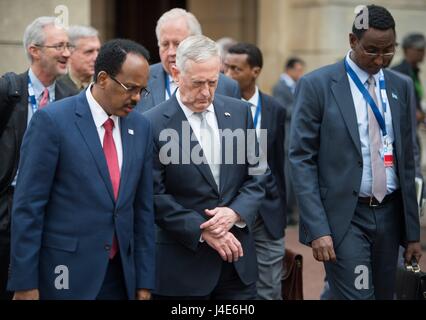 U.S. Secretary of Defense James Mattis, center, walks with Somali President Farmajo at the London Somalia Conference at the Lancaster House May 11, 2017 in London, United Kingdom. Stock Photo