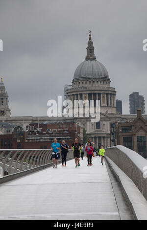 City of London, UK. 13th May 2017. UK Weather: Cloudy spells with drizzle on Millenium bridge for Saturday morning walkers and joggers Credit: WansfordPhoto/Alamy Live News Stock Photo