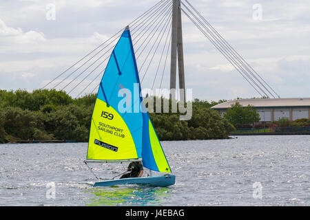 Yachting on a windy Southport, Merseyside.  UK Weather.  Clearing Skies and a Fresh breeze over Marine Lake as Southport Sailing Club stages it 2017 Open Day. The club is fully booked for trial and novice sailors to enjoy one half hour on the resorts Marine Lake, in testing conditions, on a variety of craft. As has been the case for the last few years this coincides with the RYA push the boat out initiative – to nationally get people on the water and interested in sailing! Credit; MediaWorldImage/AlamyLiveNews Stock Photo