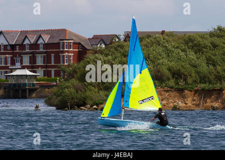 Yachting on a windy Southport, Merseyside.  UK Weather.  Clearing Skies and a Fresh breeze over Marine Lake as Southport Sailing Club stages it 2017 Open Day. The club is fully booked for trial and novice sailors to enjoy one half hour on the resorts Marine Lake, in testing conditions, on a variety of craft. As has been the case for the last few years this coincides with the RYA push the boat out initiative – to nationally get people on the water and interested in sailing! Credit; MediaWorldImage/AlamyLiveNews Stock Photo