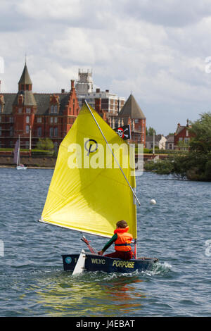 Southport, Merseyside, UK.  UK Weather.  Clearing Skies and a Fresh breeze over Marine Lake as Southport Sailing Club stages it 2017 Open Day. The club is fully booked for trial and novice sailors to enjoy one half hour on the resorts Marine Lake, in testing conditions, on a variety of craft. As has been the case for the last few years this coincides with the RYA push the boat out initiative – to nationally get people on the water and interested in sailing! Credit; MediaWorldImage/AlamyLiveNews Stock Photo