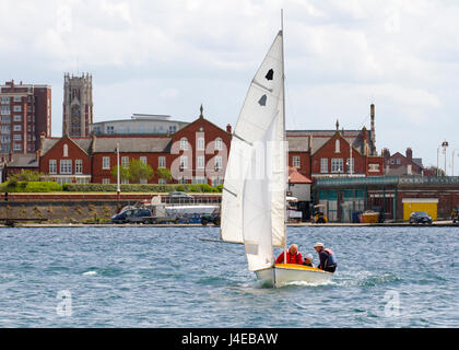 Yachting on a windy Southport, Merseyside.  UK Weather.  Clearing Skies and a Fresh breeze over Marine Lake as Southport Sailing Club stages it 2017 Open Day. The club is fully booked for trial and novice sailors to enjoy one half hour on the resorts Marine Lake, in testing conditions, on a variety of craft. As has been the case for the last few years this coincides with the RYA push the boat out initiative – to nationally get people on the water and interested in sailing! Credit; MediaWorldImage/AlamyLiveNews Stock Photo