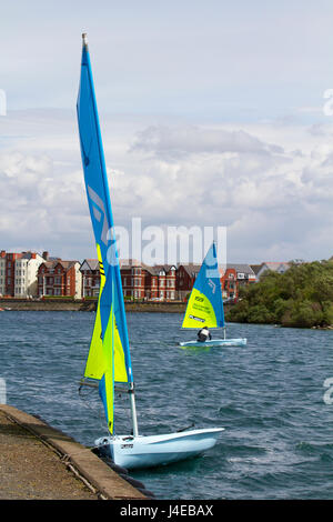 Yachting on a windy Southport, Merseyside.  UK Weather.  Clearing Skies and a Fresh breeze over Marine Lake as Southport Sailing Club stages it 2017 Open Day. The club is fully booked for trial and novice sailors to enjoy one half hour on the resorts Marine Lake, in testing conditions, on a variety of craft. As has been the case for the last few years this coincides with the RYA push the boat out initiative – to nationally get people on the water and interested in sailing! Credit; MediaWorldImage/AlamyLiveNews Stock Photo