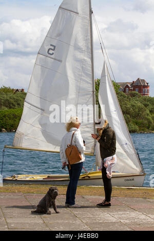 Yachting on a windy Southport, Merseyside.  UK Weather.  Clearing Skies and a Fresh breeze over Marine Lake as Southport Sailing Club stages it 2017 Open Day. The club is fully booked for trial and novice sailors to enjoy one half hour on the resorts Marine Lake, in testing conditions, on a variety of craft. As has been the case for the last few years this coincides with the RYA push the boat out initiative – to nationally get people on the water and interested in sailing! Credit; MediaWorldImage/AlamyLiveNews Stock Photo