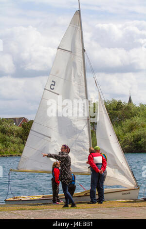 Yachting on a windy Southport, Merseyside.  UK Weather.  Clearing Skies and a Fresh breeze over Marine Lake as Southport Sailing Club stages it 2017 Open Day. The club is fully booked for trial and novice sailors to enjoy one half hour on the resorts Marine Lake, in testing conditions, on a variety of craft. As has been the case for the last few years this coincides with the RYA push the boat out initiative – to nationally get people on the water and interested in sailing! Credit; MediaWorldImage/AlamyLiveNews Stock Photo