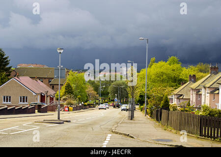 Airdrie, North Lanarkshire, Scotland, UK, Saturday, 13. 05. 2017, weather. Streets of Airdrie during cloudy weather and heavy rain coming changing the weather from very warm and sunny into rainy and cloudy. Credit: Malgorzata Larys/Alamy Live News Stock Photo