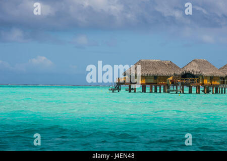 Overwater bungalows in luxury hotel in Bora Bora, Society Islands, French Polynesia, Pacific Stock Photo