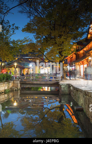 Canalside restaurant at dusk, Lijiang, UNESCO World Heritage Site, Yunnan, China, Asia Stock Photo