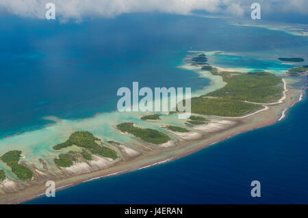 Aerial of the blue lagoon in Rangiroa, Tuamotus, French Polynesia, Pacific Stock Photo