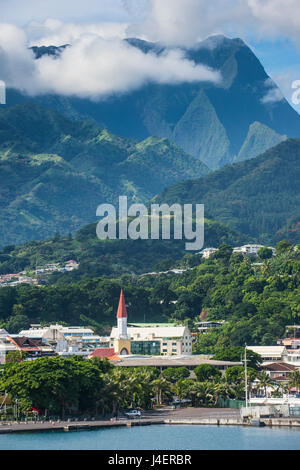 Dramatic mountains looming behind Papeete, Tahiti, Society Islands, French Polynesia, Pacific Stock Photo