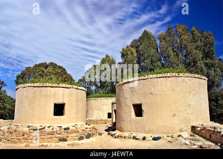 Reconstructed structures  in the archaeological site of Choirokoitia (UNESCO World Heritage Site), a neolithic settlement, Larnaca district, Cyprus. Stock Photo