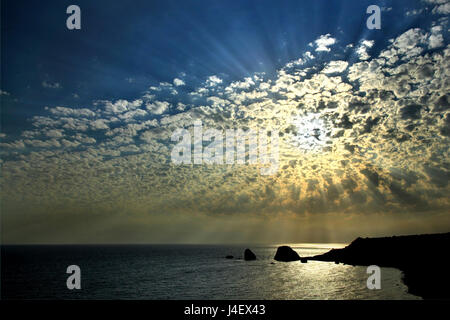 Sunset at 'Petra tou Romiou' ('Greek's Rock', also known as 'Aphrodite's Rock' or 'Aphrodite's beach'), the 'birthplace' of Aphrodite (Venus), Cyprus. Stock Photo