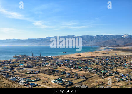 Southern shore of Lake Baikal, Khamar-Daban Range and village Kultuk. Irkutsk region. Russia Stock Photo