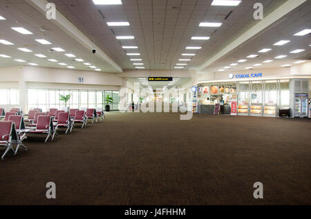 Thai people and foreigner travelers waiting flight and walking inside of Don Mueang international airport on February 21, 2017 in Bangkok, Thailand Stock Photo