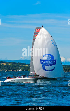 Sailing boat flying a spinnaker sail on Lake Geneva, boat ...