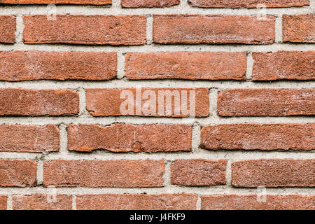 Red brick wall old stones bricks white grey joints Stock Photo