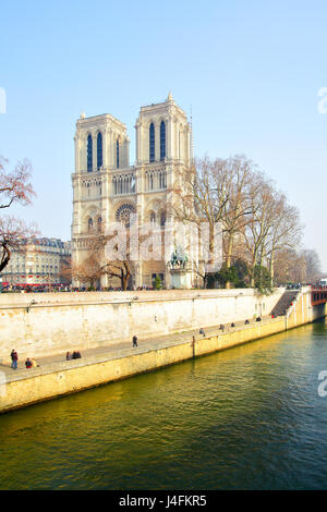 Notre Dame de Paris and Seine's quay in spring, France Stock Photo