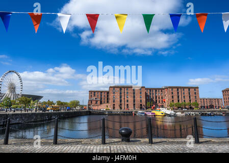 Albert Dock, Liverpool with summer bunting and big wheel. Stock Photo