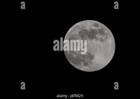 Fullmoon full moon april in night dark shining bright Stock Photo
