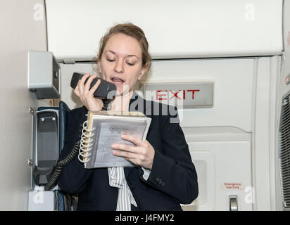 Spouses of 1st Airlift Squadron and 99th Airlift Squadron pilots, communications systems operators, flight attendants, flight engineers and flying crew chiefs fly on board Boeing C-32A and C-40B, and Gulfstream C-37B and C-37A aircraft during the 89th Airlift Wing spouse appreciation day at Joint Base Andrews, Md., Jan. 11, 2016. The 89th AW maintains and operates 'Air Force One' and 14 other special air mission platforms. (U.S. Air Force photo by Senior Master Sgt. Kevin Wallace/RELEASED) Stock Photo