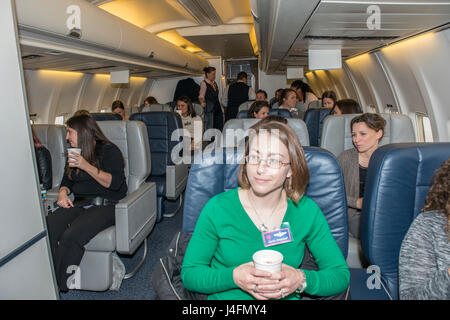 Spouses of 1st Airlift Squadron and 99th Airlift Squadron pilots, communications systems operators, flight attendants, flight engineers and flying crew chiefs fly on board Boeing C-32A and C-40B, and Gulfstream C-37B and C-37A aircraft during the 89th Airlift Wing spouse appreciation day at Joint Base Andrews, Md., Jan. 11, 2016. The 89th AW maintains and operates 'Air Force One' and 14 other special air mission platforms. (U.S. Air Force photo by Senior Master Sgt. Kevin Wallace/RELEASED) Stock Photo