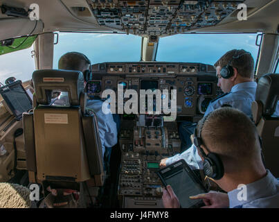 Spouses of 1st Airlift Squadron and 99th Airlift Squadron pilots, communications systems operators, flight attendants, flight engineers and flying crew chiefs fly on board Boeing C-32A and C-40B, and Gulfstream C-37B and C-37A aircraft during the 89th Airlift Wing spouse appreciation day at Joint Base Andrews, Md., Jan. 11, 2016. The 89th AW maintains and operates 'Air Force One' and 14 other special air mission platforms. (U.S. Air Force photo by Senior Master Sgt. Kevin Wallace/RELEASED) Stock Photo