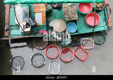 Woman selling long fish, Market, Kalabahi, Alor, Indonesia Stock Photo -  Alamy