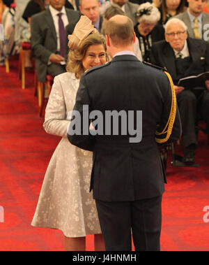 Alison Baum from London is made an OBE (Officer of the Order of the British Empire) by the Duke of Cambridge, during an Investiture ceremony at Buckingham Palace, London. Stock Photo