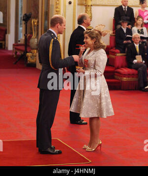 Alison Baum from London is made an OBE (Officer of the Order of the British Empire) by the Duke of Cambridge, during an Investiture ceremony at Buckingham Palace, London. Stock Photo