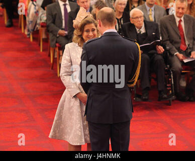 Alison Baum from London is made an OBE (Officer of the Order of the British Empire) by the Duke of Cambridge, during an Investiture ceremony at Buckingham Palace, London. Stock Photo