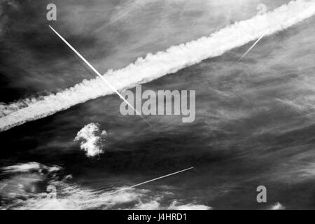 Black & white jet contrails against a clear Colorado sky Stock Photo