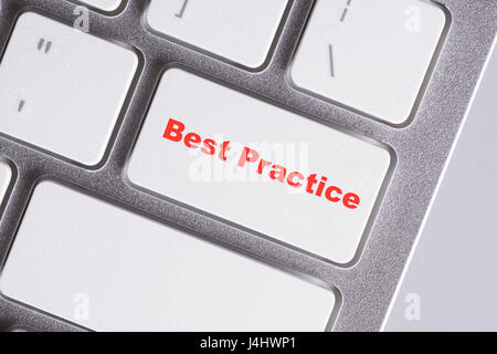 "Best Practice" red words on white keyboard - online, education and business concept Stock Photo