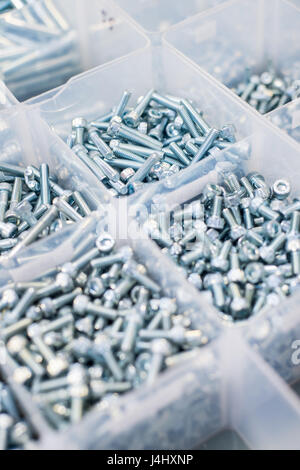 Stock of different sizes of bolts with Allen key fittings Stock Photo