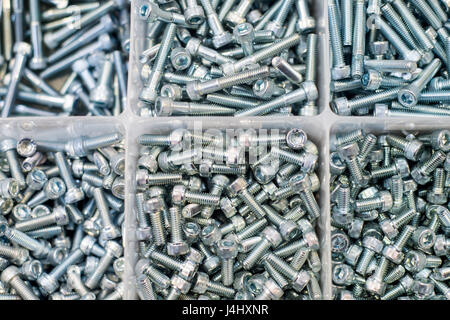 Stock of different sizes of bolts with Allen key fittings Stock Photo