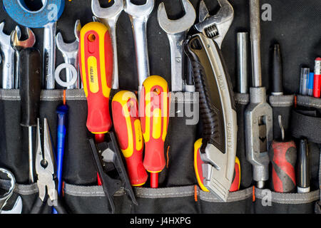 Selection of Electricians tools in a pouch Stock Photo
