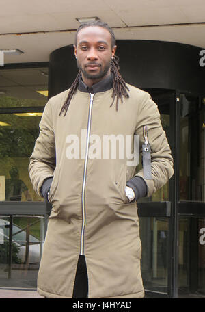 Footballer Marvin Emnes outside Swansea Crown Court after his conviction for failing to provide the details of a driver as the registered keeper of a car was quashed. Stock Photo